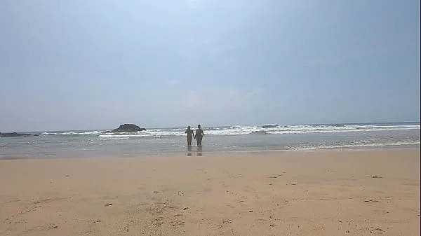 Walking nude freely & having fun on public nudist beach videos