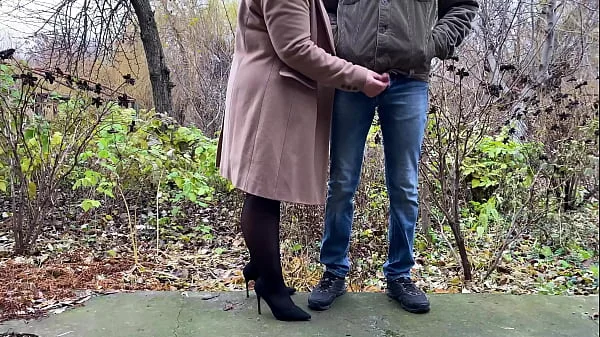 StepMother-in-law in leather skirt and heels holds son-in-law's dick while he pees videos