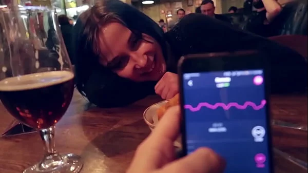 I took control of my stepsister's vibrator in the bar and brought her to orgasm. videos