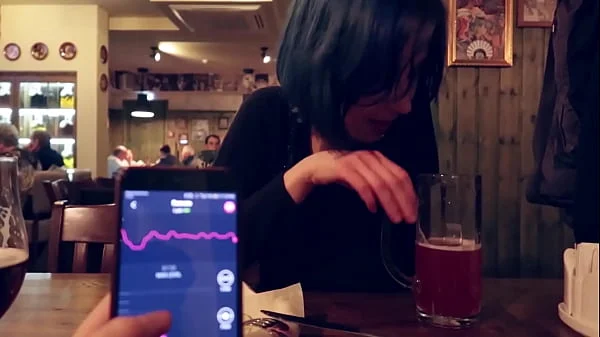I took control of my stepsister's vibrator in the bar and brought her to orgasm. videos