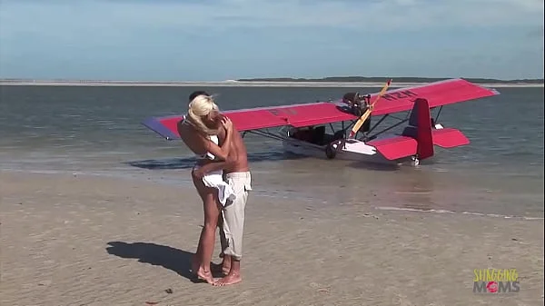 Passionate fucking on the beach with a stunning blonde with big tits videos