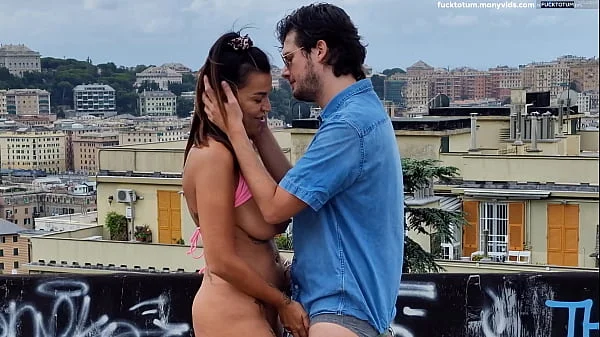 A couple fucking on a balcon in the middle of the city, not giving a damn about the fact that everyone can see them! videos