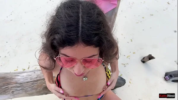 Golden shower for Katty on the public beach videos