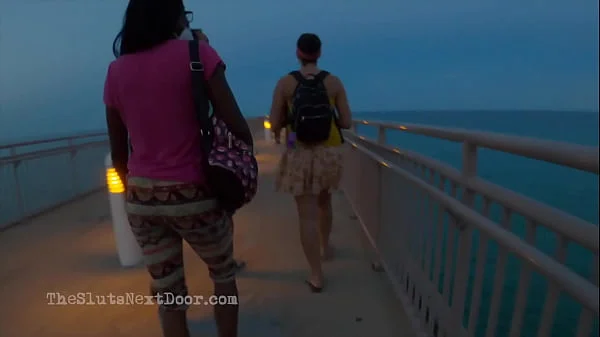 Double handjob on public beach videos