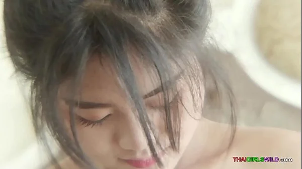 Adorable Thai amateur has her tight pussy stuffed videos