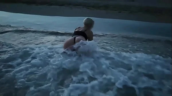 Blonde shows tits and sucks cock on a public beach videos