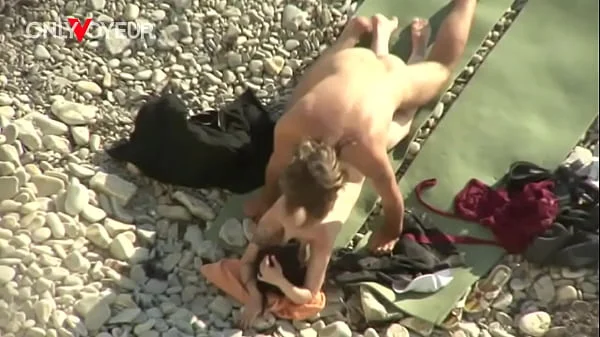 Beach Voyeur. Is fresh sperm good as a sunblock cream? videos