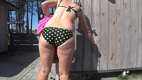 Juicy booty in shorts goes outdoors, changes clothes in a public booth on the beach, bathes and sunbathes. Fetish with peeping. videos