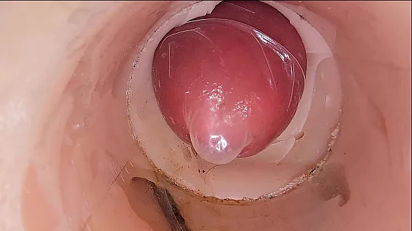 The camera in the deep pussy records a huge ejaculation of sperm into the condom videos