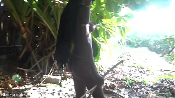 Naked skinny tribe woman making a bow to go hunting videos