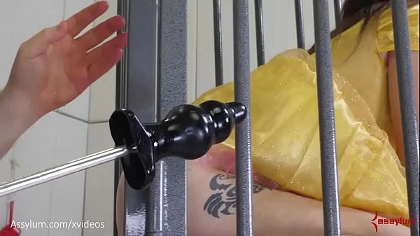 Caged princess gets rough ass to mouth with gnarly butt plug and drinks piss in bondage videos
