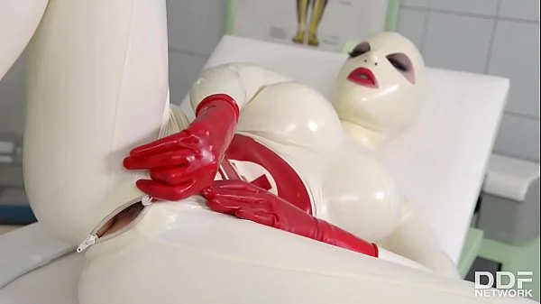 Busty Latex Lucy spanks her ass & fills her creamy pussy with clinic sex toy videos