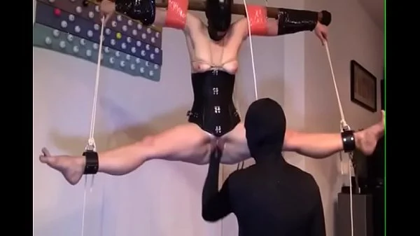 Restrained, bound, legs spread & suspended from ceiling. Masked vagina fisting. videos