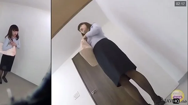 Office Lady wetting herself in the bathroom videos