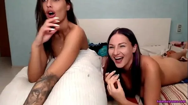 Twins are playing twister in front of cam videos