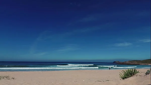 PISS PISS TRAVEL - Russian nudist girl Sasha Bikeyeva pissing on a public beach Doninos on Galicia Spain videos