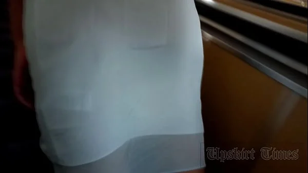 Upskirt at the tanned beauty without panties. videos