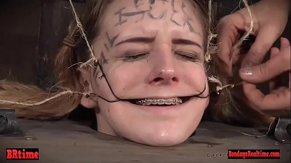 Bdsm babe trapped in a barrel and electrified videos