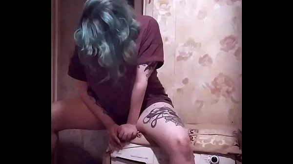 Teen girl loves to have fun on the washing machine videos