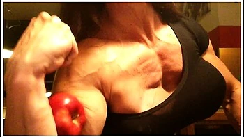 Muscle Girl Destroys Bad Apple With Her Huge Bicep videos