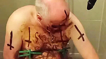 Satan slave takes perverted enema treatment videos