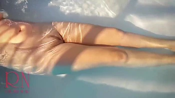 Elegant And Flexible Babe, Swimming Underwater In The Outdoor Swimming Pool. 2 2 videos