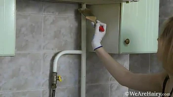 Lavatta W strips and masturbates in her kitchen - WeAreHairy videos