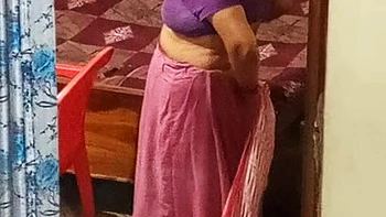 Aunty caught red handed on camera while changing dress. videos
