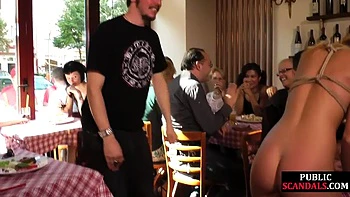 Tied bitch giving head in public caffe videos