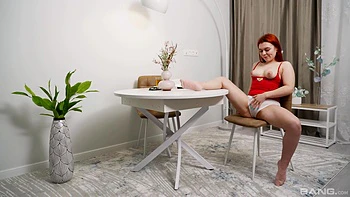 A cute girl named Fessa Lux plays with her pussy on a chair, achieving orgasm. videos