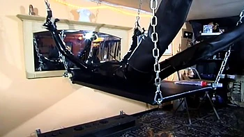 Humiliating chaining body stretching in latex dress videos