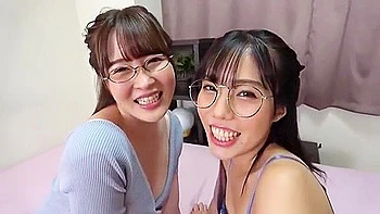 He spreads her legs, performs cunnilingus, puts on a strap-on, gives her a blowjob, and then fucks her. videos