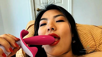 Watch Nari Park play with her hairy Asian pussy while adding a toy to the mix: Porn videos