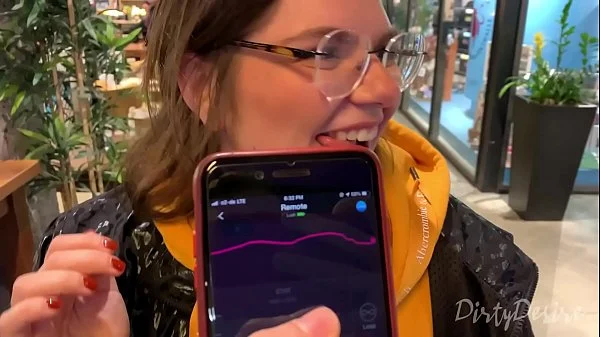 I control her pussy in public with a lovense lush - she moans and is embarassed videos