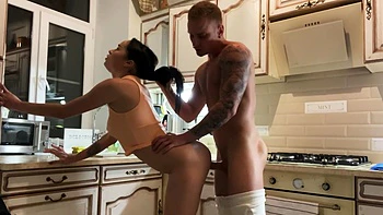 Brunette with long hair has sex in the kitchen videos