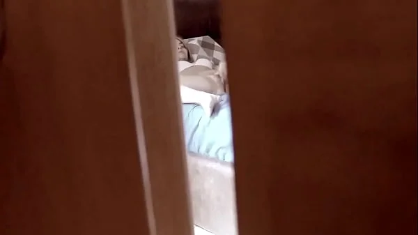 Spying behind a door a teen stepdaughter masturbating in bedroom and coming very intense videos