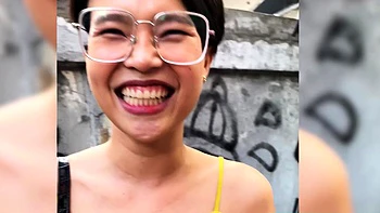 Skinny Thai girl with glasses loves sex videos
