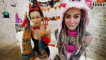 Tattooed girlfriend Anuskatzz and Stacy Bloom are enjoying their toys videos