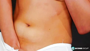 Slender brunette with natural tits Eveline stimulates her shaved pussy videos