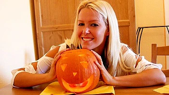 Gorgeous blonde Sophie Moone is making a nice Halloween pumpkin videos