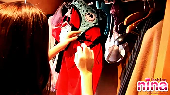 Lesbo Nina strips then gets dressed in the closest videos