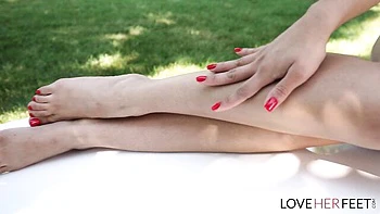 Love Her Feet featuring Megan Love's foot worship scene videos