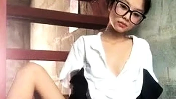 Asian teen plays with toys on webcam videos