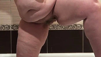 MILF with Big Tits and Hairy Pussy Takes Off Dirty Panties to Piss in Bathroom - PAWG Amateur Video videos