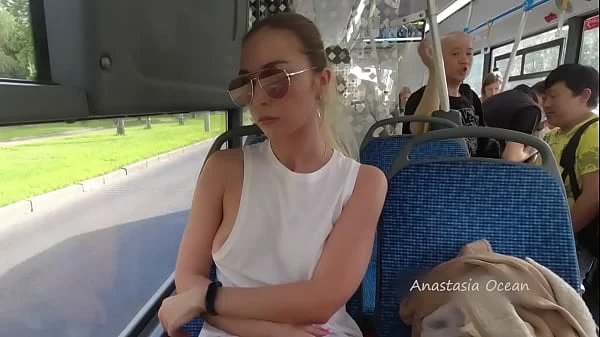 A girl rides a public bus with bare breasts videos