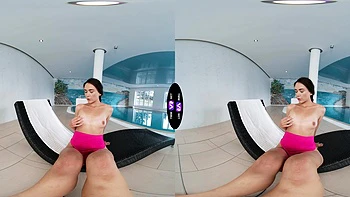 A young and beautiful girl, Vixi Rafi, has fun by the pool in vr videos